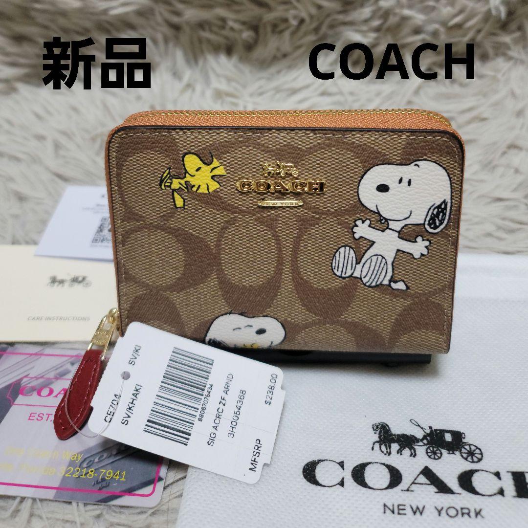 新品未使用✨COACH コーチ スヌーピーコラボ　シグネチャー 2つ折り財布